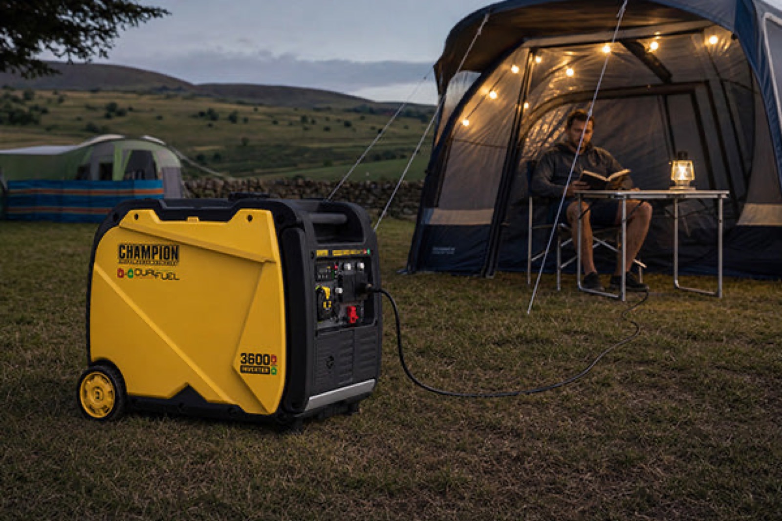 Champion 2200i at the foot of a tent at dusk